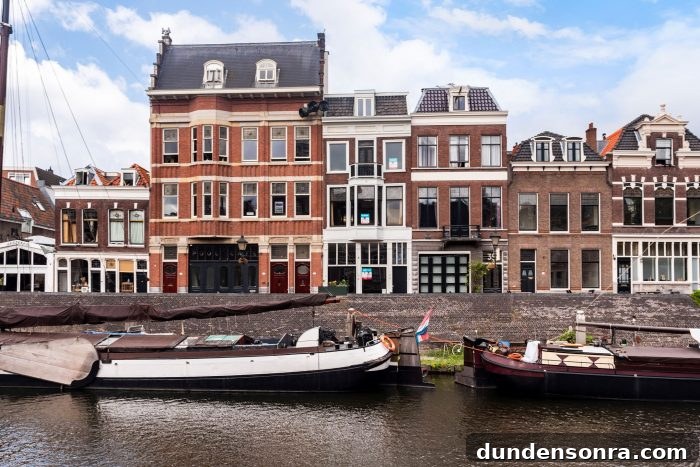 Boats docked next to buildings