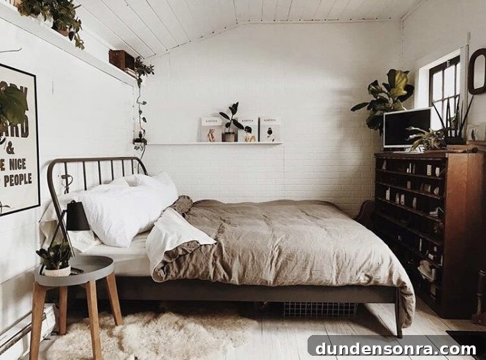 A bedroom with a bed and a tv