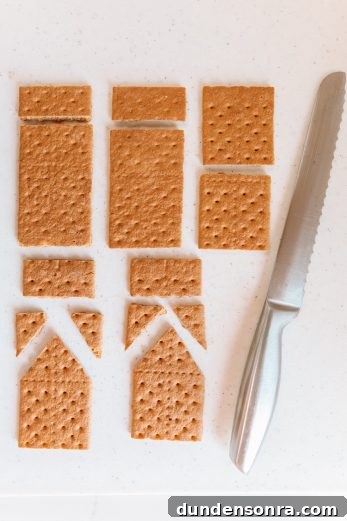 Edible Haunted Houses: Halloween Candy House Ideas and Guide 9 Graham crackers on a counter