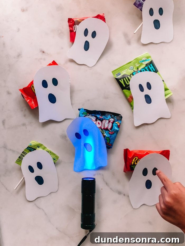 Ultimate Halloween Bucket List: Free Printable Checklist 8 Black Light Halloween Candy Hunt with Paper Ghosts