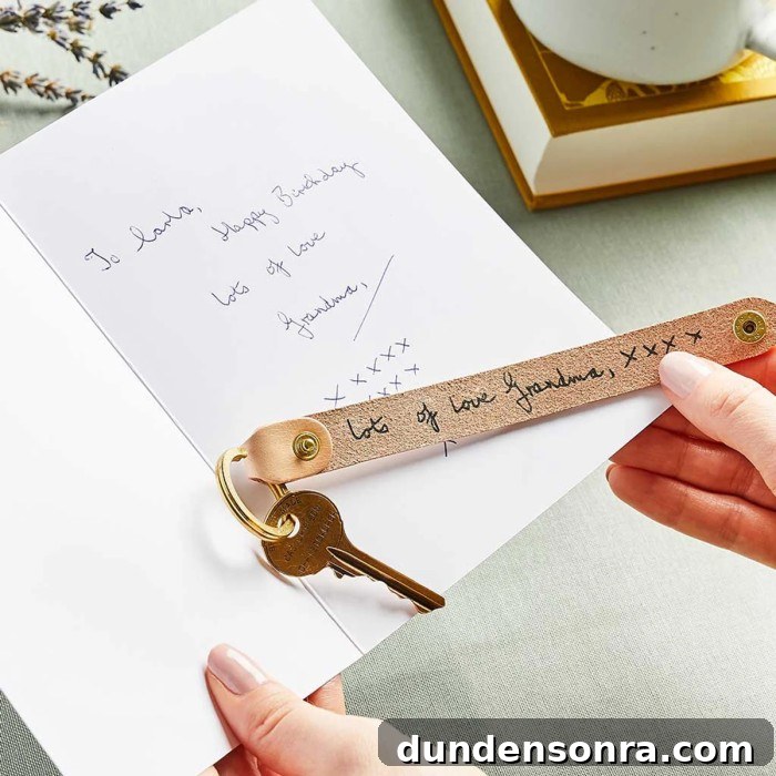 key fob with handwriting on it