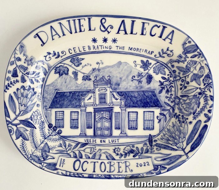 blue and white plate with house on it