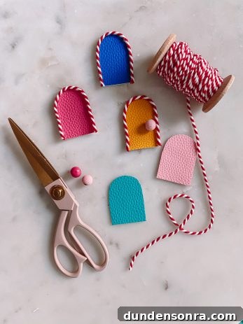Tiny colorful doors with string around them