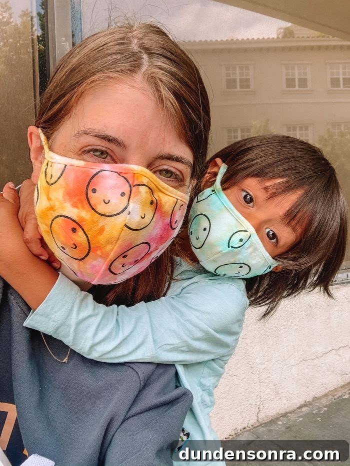 A mother and her son with masks on