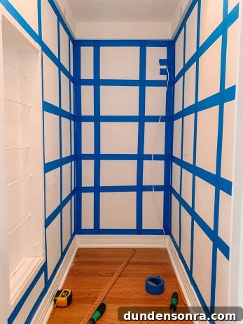Painter's Tape Grid on Wall for Wallpaper