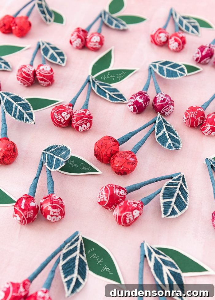 Tootsie pops tied together to be made to look like cherries. 