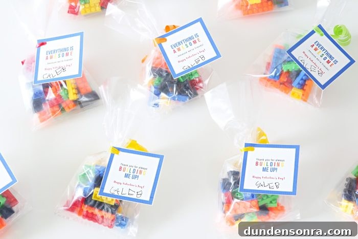 Packages of legos with valentine's messages on them. 