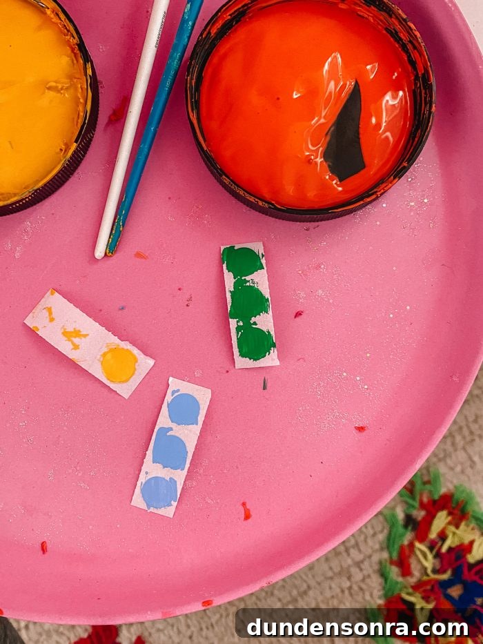 DIY Rainbow Bookshelves: Transform IKEA Shelves with Paint 10 A close up of a plate on a table with paint