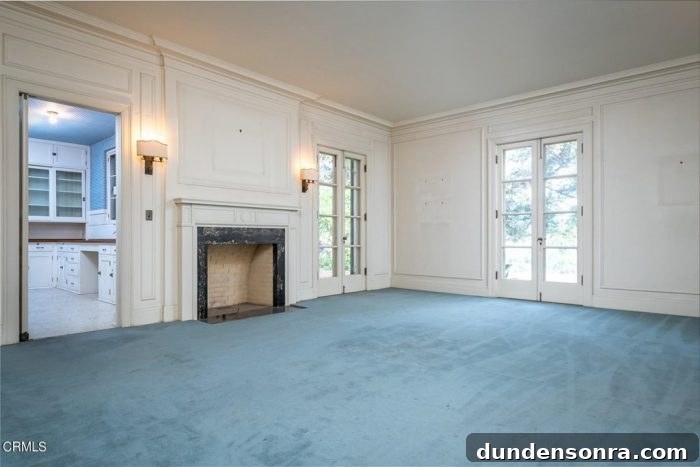 Homes I’d Love to Live In: Volume 2 11 A large room with blue rug