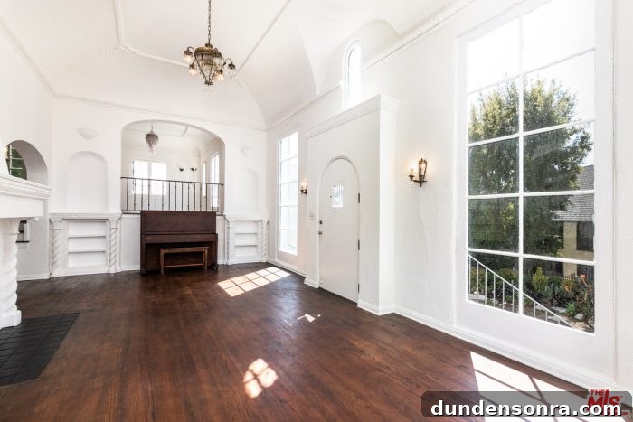 Homes I’d Love to Live In: Volume 2 21 A living room with white walls and wood floors