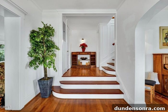 Homes I’d Love to Live In: Volume 2 26 A staircase with a plant