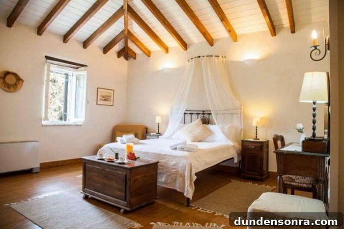 Homes I’d Love to Live In: Volume 2 31 A bedroom with a bed and ceiling with beams