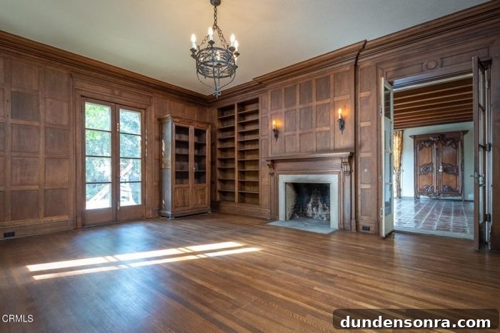 Homes I’d Love to Live In: Volume 2 8 A living room with a fireplace and a large window