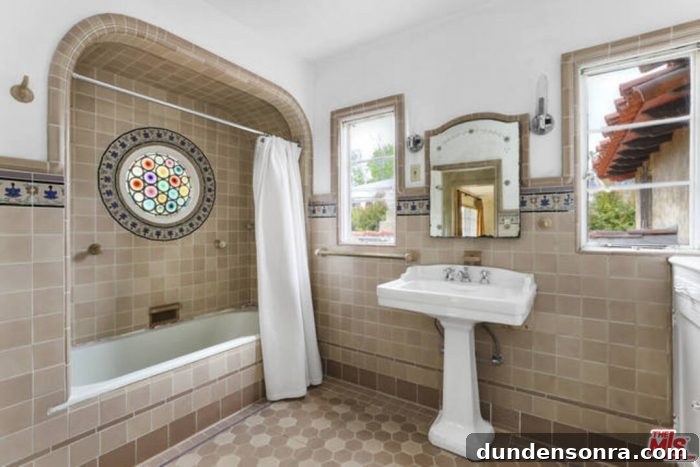 Dream Homes I’d Live In: Inspiring House Designs Vol. 3 15 A bathroom room with a sink, a mirror, and a bath
