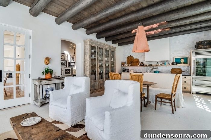 Dream Homes I’d Live In: Inspiring House Designs Vol. 3 22 A living room filled with chairs and a bookcase