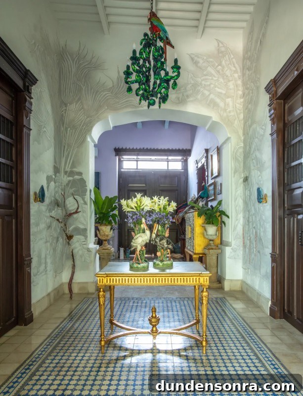Dream Homes I’d Live In: Inspiring House Designs Vol. 3 6 An entrance to a house with a gold table and flowers