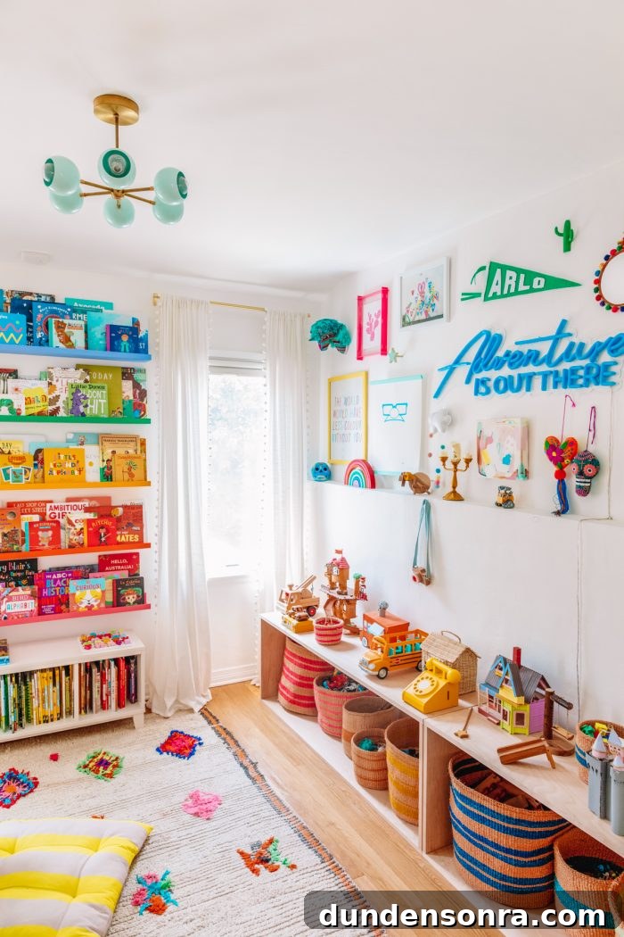 Arlo’s Colorful Big-Kid Bedroom Ideas 3 A bedroom with toys and bookshelves