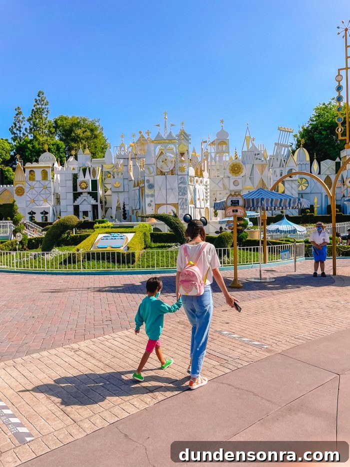 Walking in front of Its A Small World