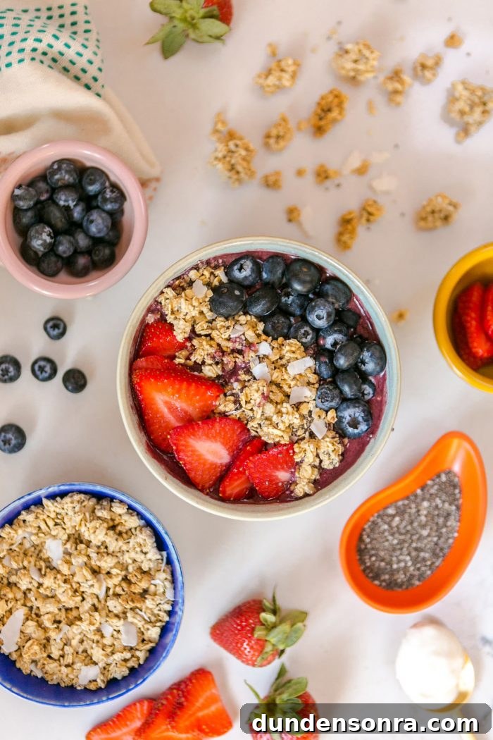 Berry Smoothie and Small Bowls of Toppings