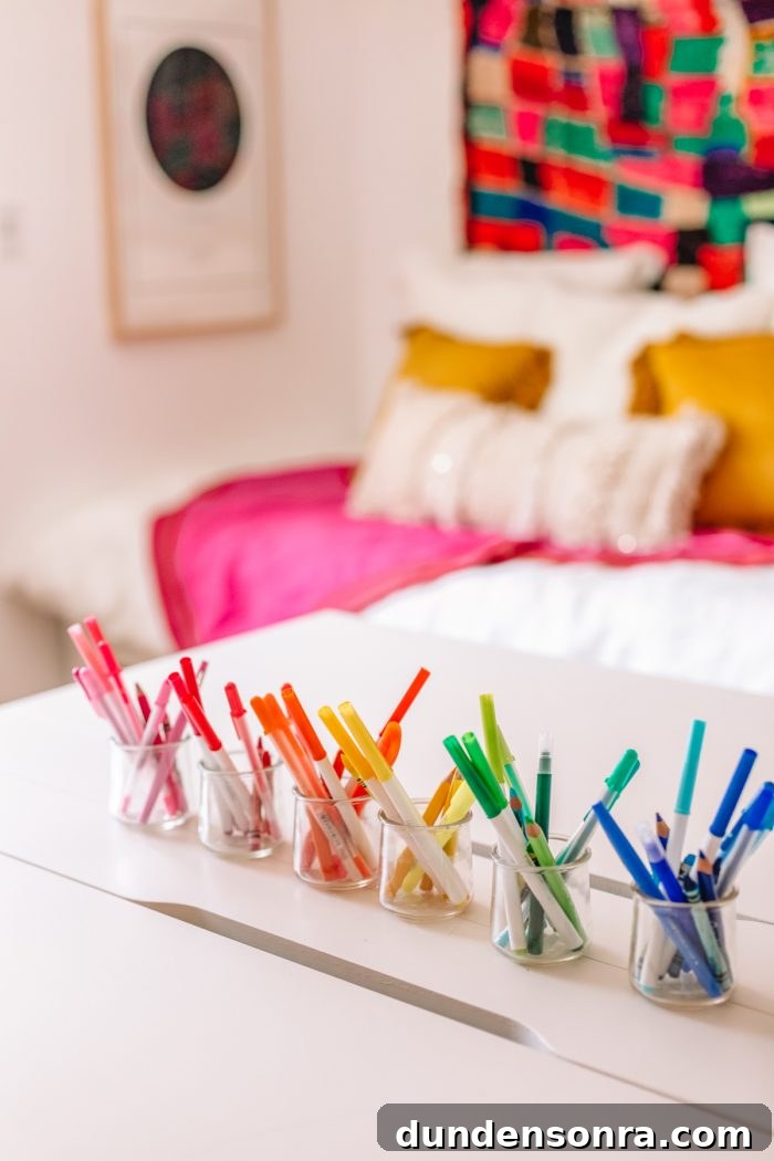 Create a Stylish Home Office and Guest Room: Design Tips for a Multipurpose Space 9 Pens organized in rainbow order in a home office