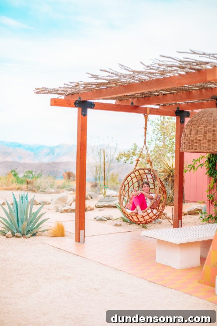 Top Things to See and Do in Joshua Tree & Yucca Valley 15 Hanging rattan chair at Oeste in Yucca Valley