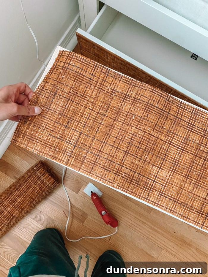 DIY Rattan BRIMNES Daybed: IKEA Hack Guide & Build Tips 7 Gluing rattan cane webbing to IKEA drawer front with hot glue gun