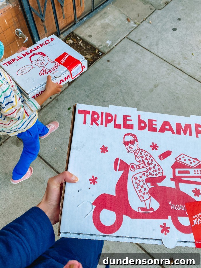 Top Los Angeles Pizzerias: A New Jersey Native’s Picks 2 Triple Beam Pizza Boxes being carried in Los Angeles