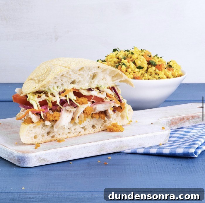 Top Sandwich Spots in Los Angeles: Where Locals Go 11 Mendocino Farms not so fried chicken sandwich on a cutting board on a table
