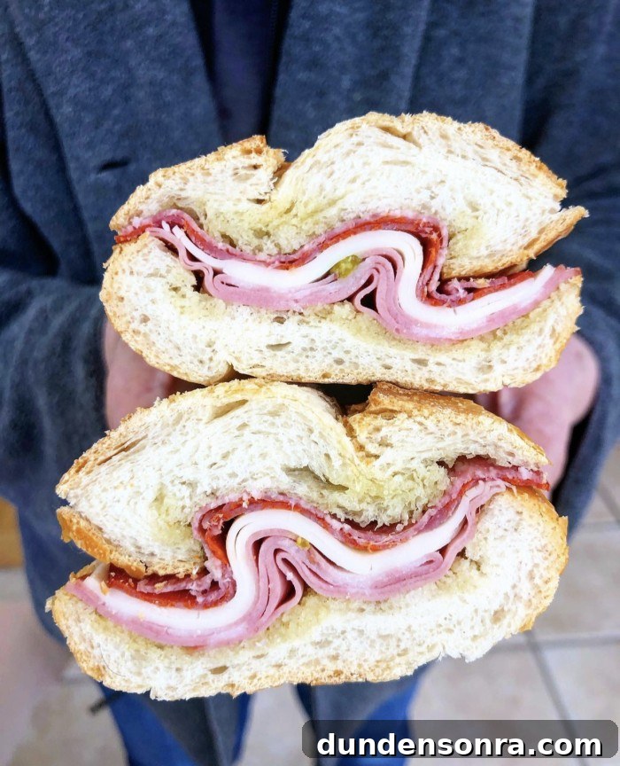 Top Sandwich Spots in Los Angeles: Where Locals Go 14 Roma market Italian meat sandwich stacked