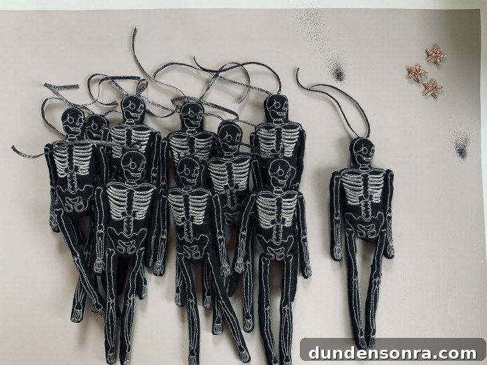 Top Halloween Home Decor Ideas to Transform Your Space 14 Black Skeleton Dolls in a pile on a table