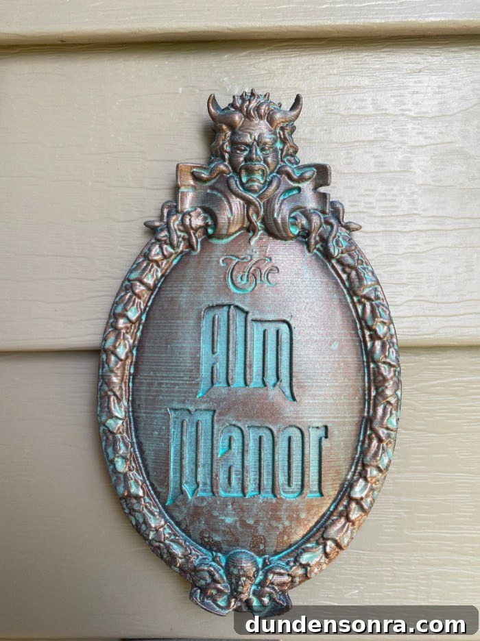 Top Halloween Home Decor Ideas to Transform Your Space 30 Haunted Mansion inspired plaque