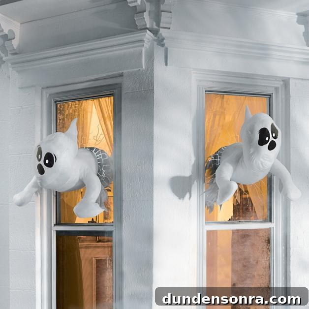 Top Halloween Home Decor Ideas to Transform Your Space 35 Plush ghosts crashing through the windows of a White House