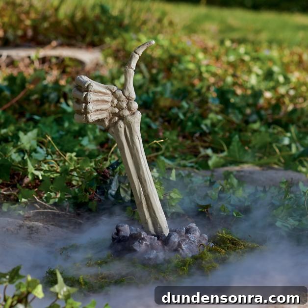 Top Halloween Home Decor Ideas to Transform Your Space 36 Skeleton Thumbs Up in a yard