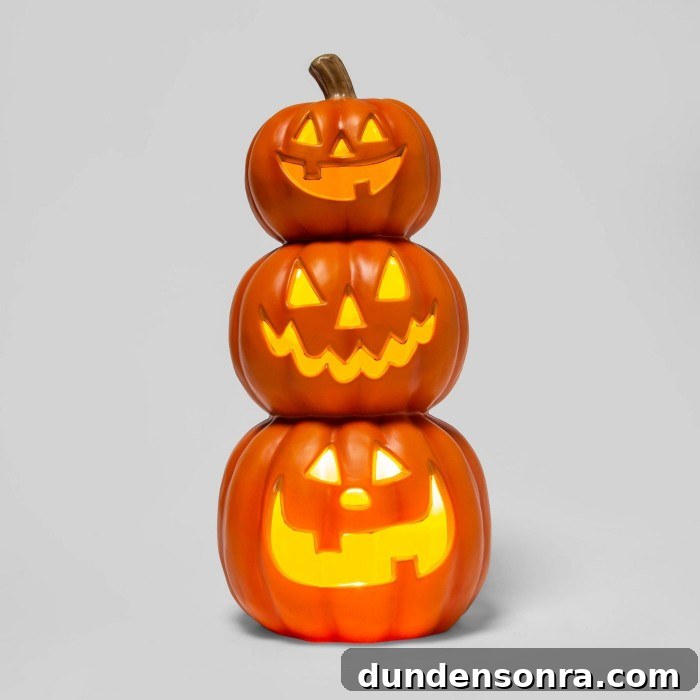 Top Halloween Home Decor Ideas to Transform Your Space 40 Three jack-o-lanterns stacked