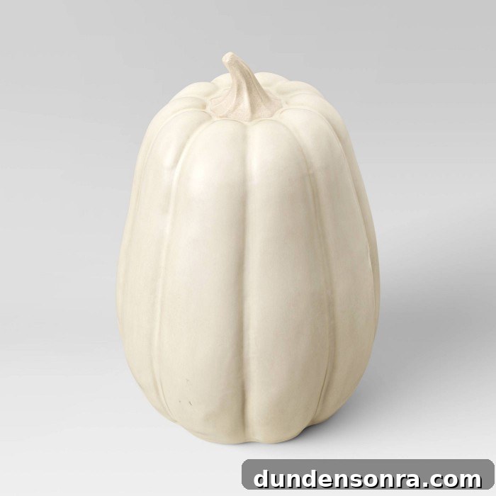 Top Halloween Home Decor Ideas to Transform Your Space 5 cream ceramic pumpkin on white background