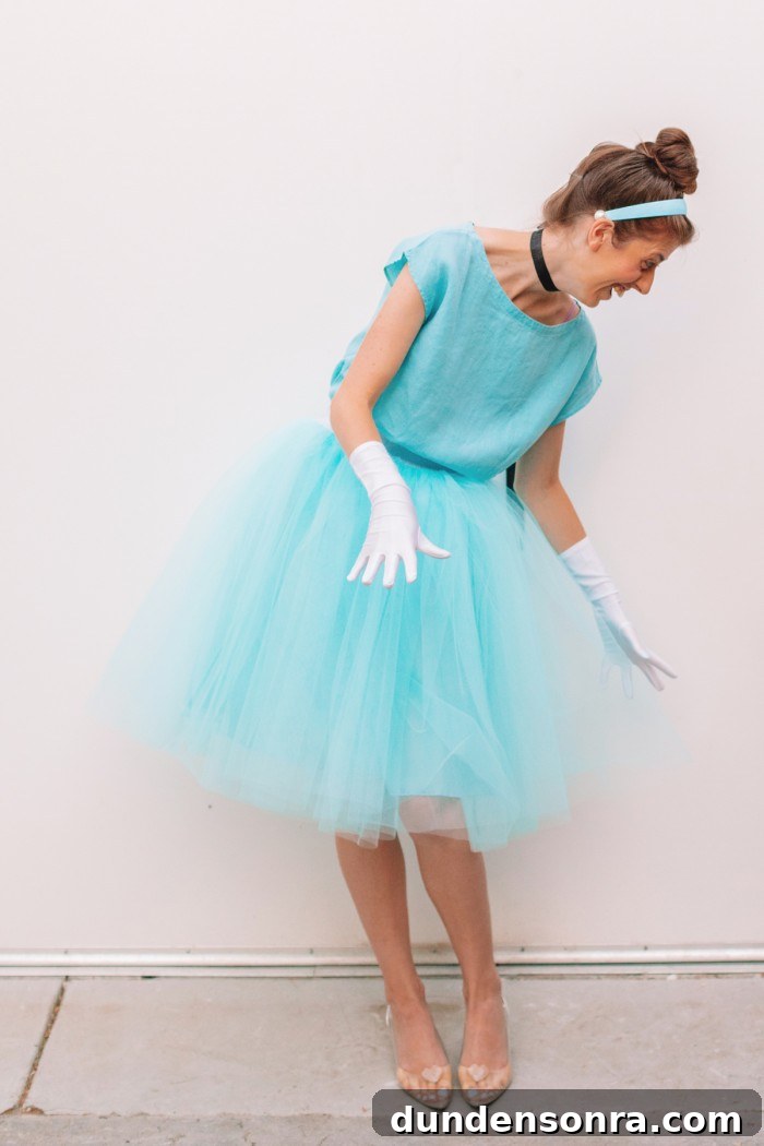 DIY Cinderella Family Costume Ideas for Matching Group Outfits 4 Woman in Cinderella costume in front of white wall