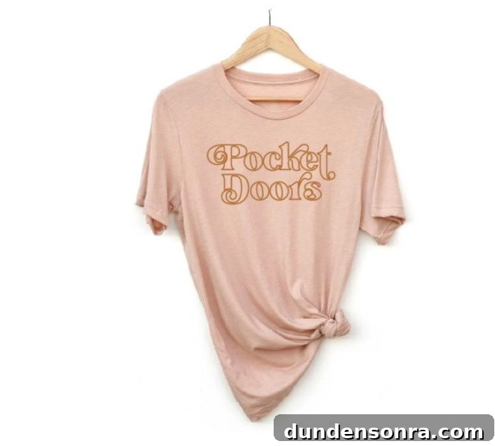 Gift Ideas for Designers and Design Enthusiasts 6 Pink shirt with yellow/gold writing "Pocket Doors"