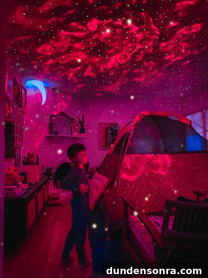 Red Galaxy Projector with tent in living room
