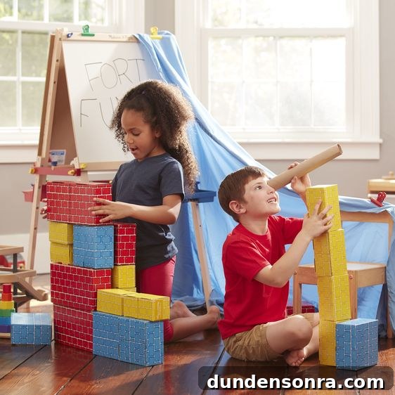 kids playing with cardboard blocks