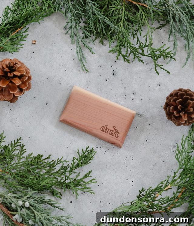 Unique Gift Ideas for People Who Truly Have Everything 11 Wood car scent with pine lines around it