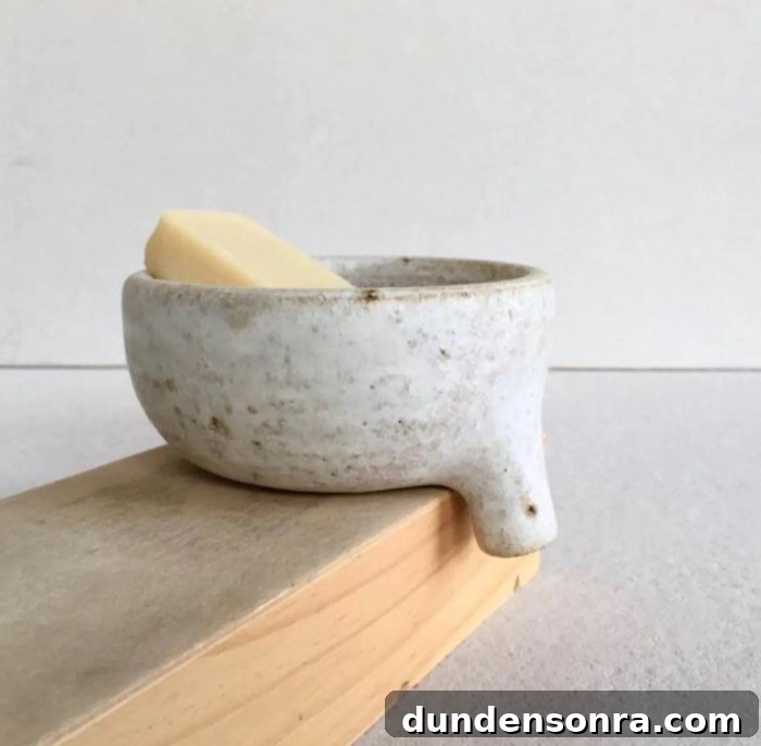 Unique Gift Ideas for People Who Truly Have Everything 19 ceramic soap dish with drain on wood board