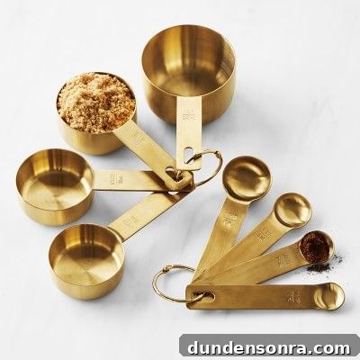 Gift Ideas for Home Chefs and Bakers 10 Beautiful gold measuring spoons and cups.