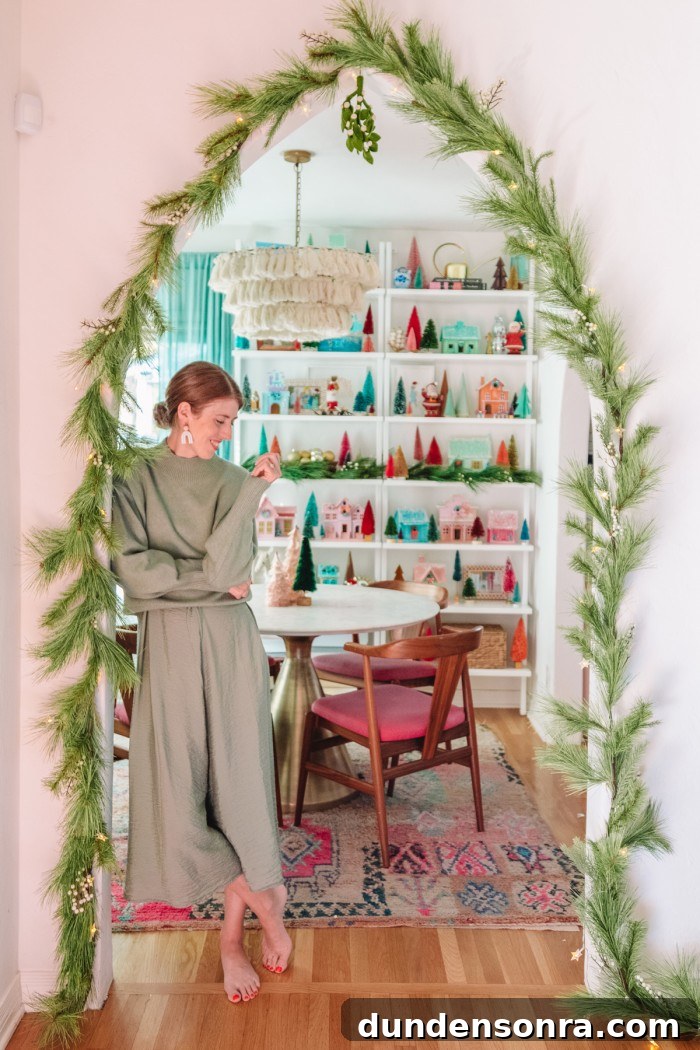 Top Etsy Cyber Week Gifts and Deals I Love 2 Woman standing in archway with Christmas garland