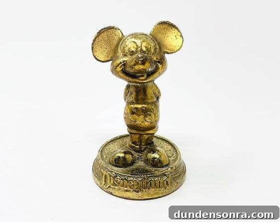 Gold Disney Paperweight