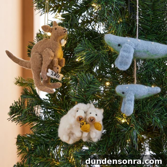 mom and baby animal ornaments on tree