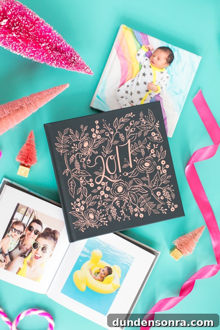 Photo books laying on blue table with ribbon