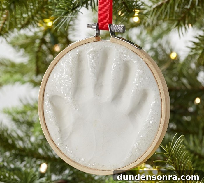 Handprint ornament hanging on tree