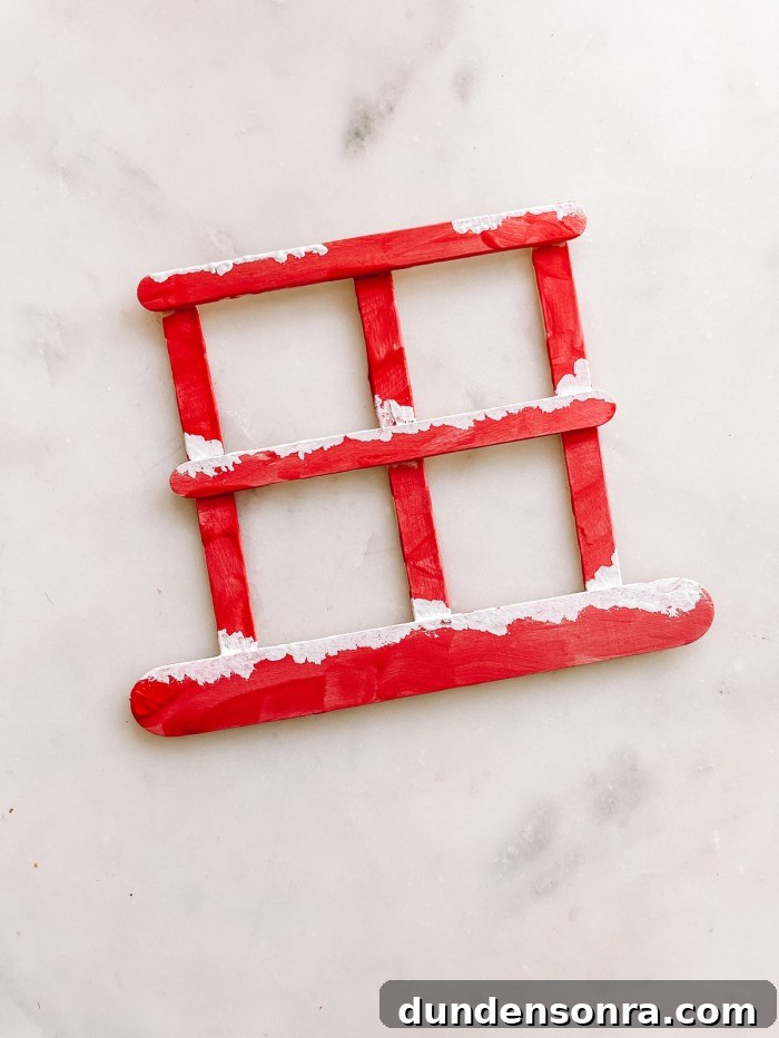 Christmas Window Popsicle Stick Ornament Craft Ideas 7 Red and white painted Popsicle stick window