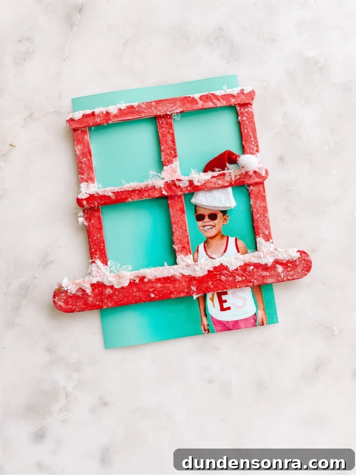 Christmas Window Popsicle Stick Ornament Craft Ideas 9 Popsicle stick window with fake snow and photo of child