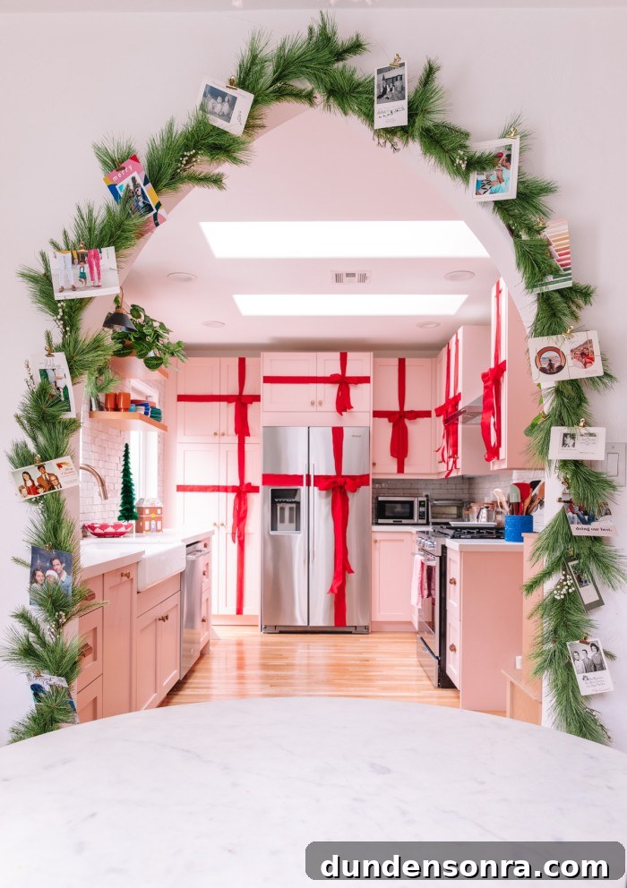 Creative Ways to Display Christmas Cards This Holiday Season 2 Christmas cards on garland around arch